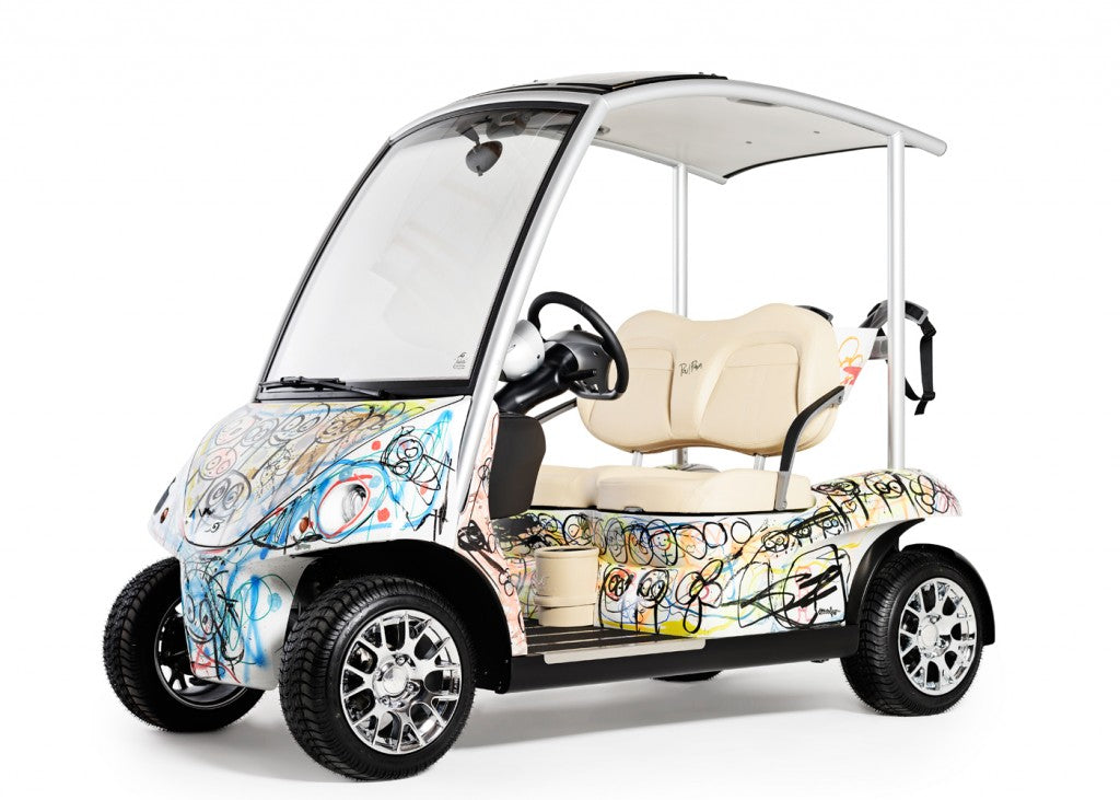 Golfbil, model Garia målad i graffitti stil